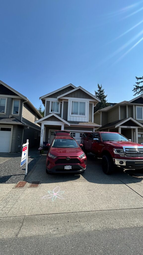 Townhome exterior in Victoria BC inspected by Watchtower Home Inspections showing previous soffit leaks and moisture repair details.