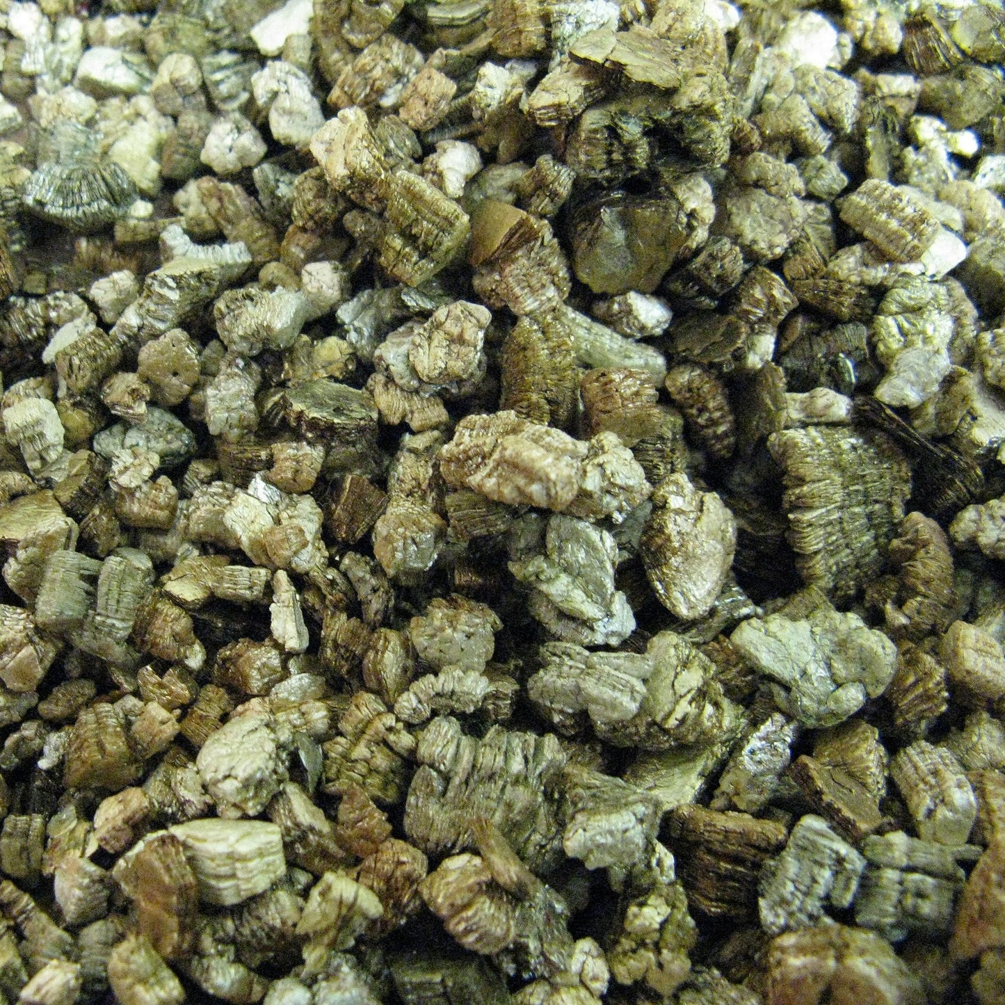 Close-up of loose expanded vermiculite granules